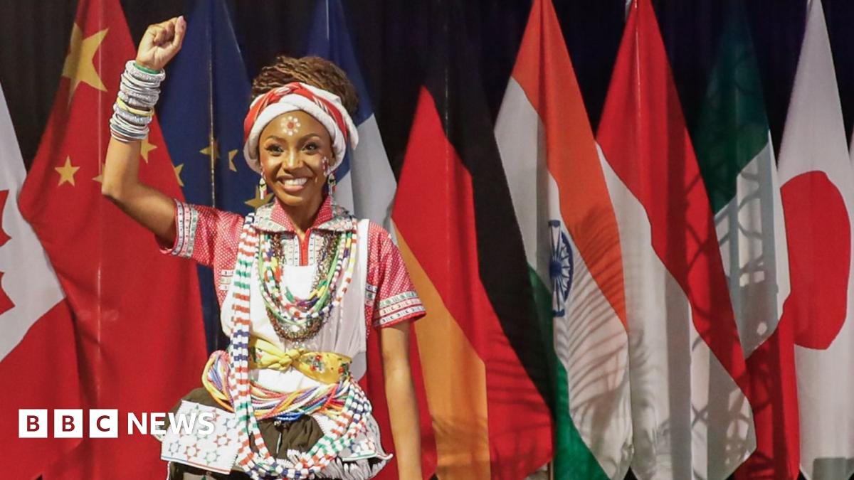 Family having a moment together messing about while winter sea swimming