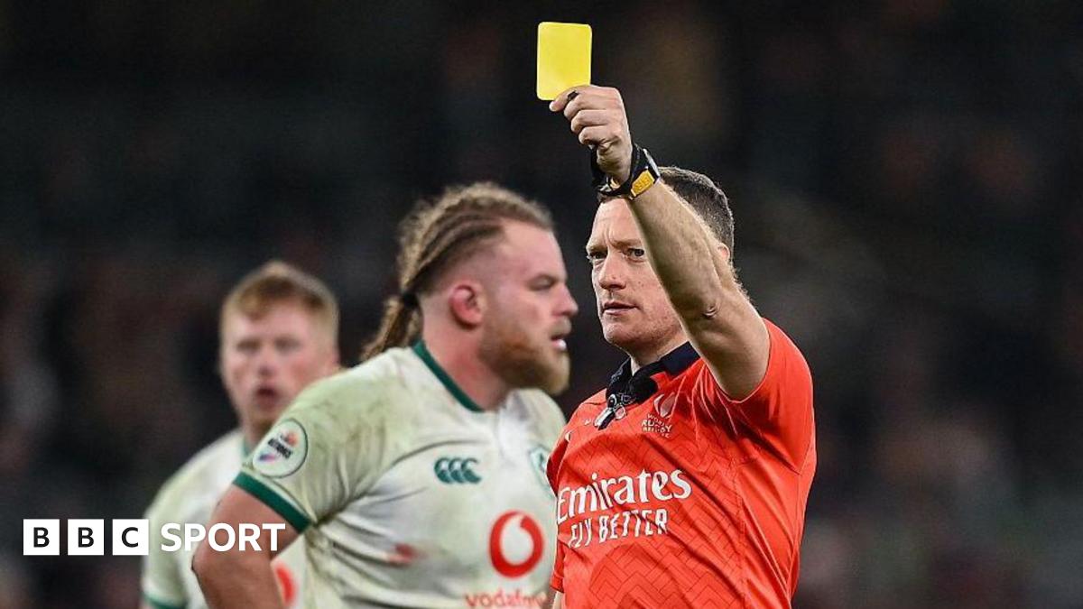 Matthew Carley shows yellow card