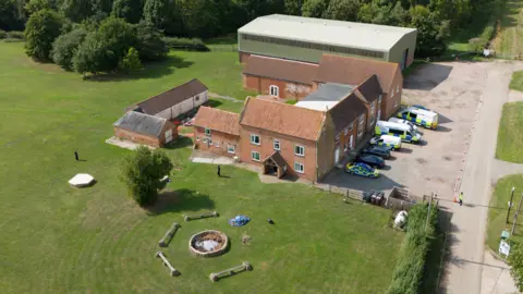 PA Media An aerial shot of the scene