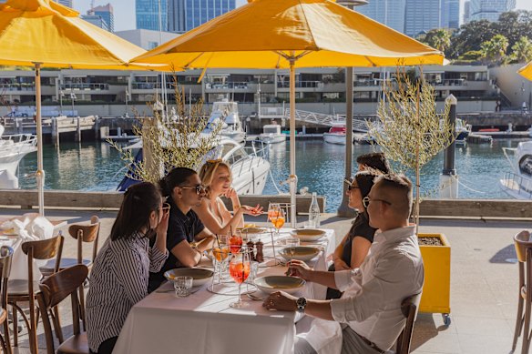 John Laws had two tables reserved for him, one inside and one outside. 