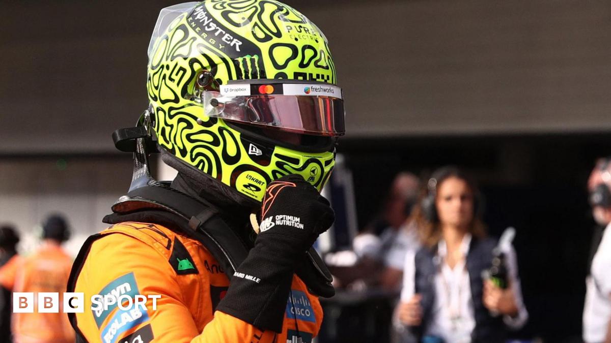 McLaren's Lando Norris clenches his right fist in celebration after taking pole position for the Sao Paulo Grand Prix sprint race