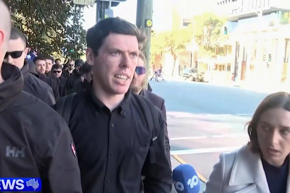 “Proud to be racist”: Jack Eltis being interviewed by a reporter after the March for Australia rally.