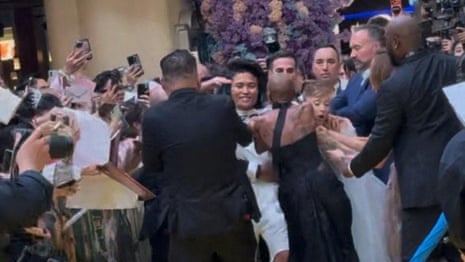 Moment man charges at Ariana Grande at Wicked premiere in Singapore – video