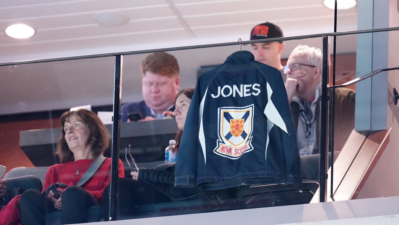 Jones's jacket hangs in suite as family members watch Canadian Curling Trials