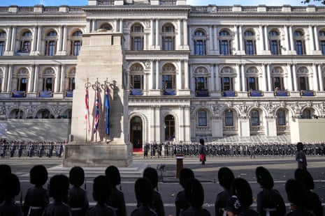 Soldiers form up on Whitehall ahead of the Remembrance Sunday service at the Cenotaph in London.