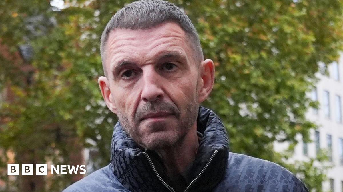 Tim Westwood arriving in court wearing a dark puffer jacket