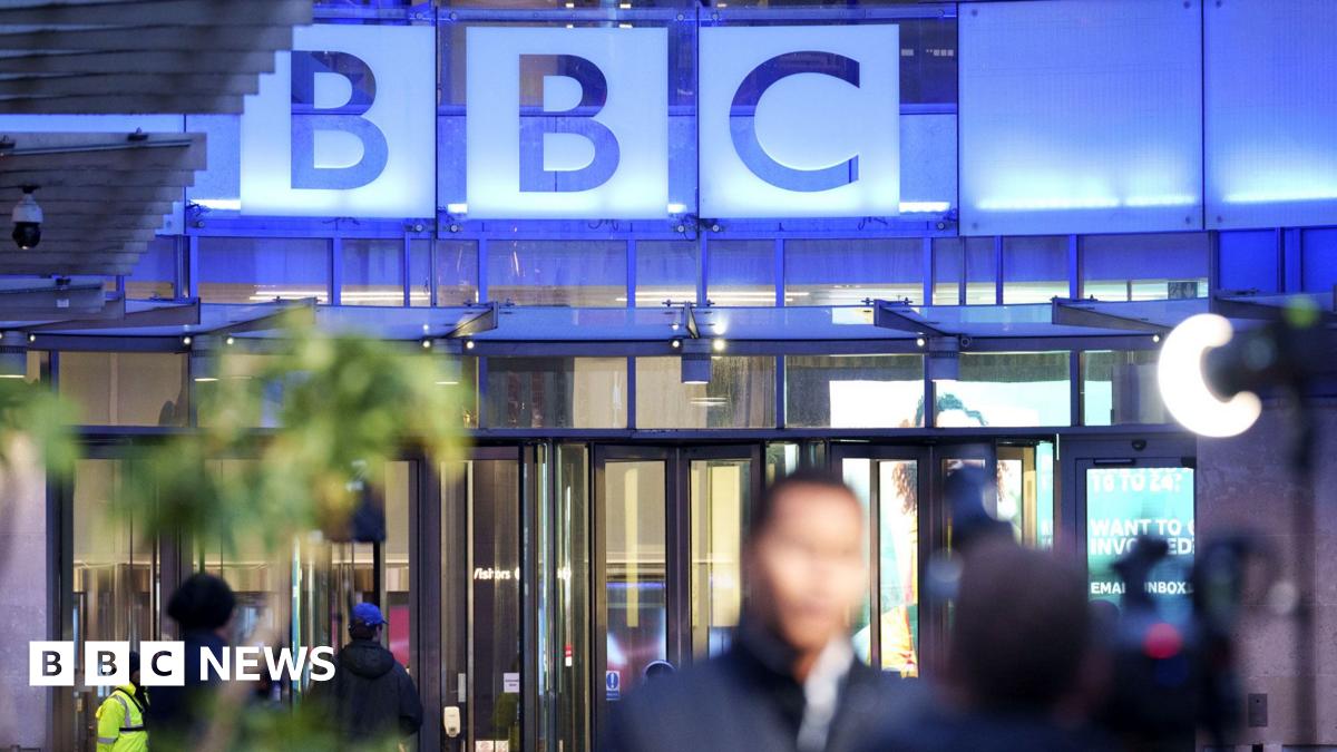 The five Celebrity Traitors finalists - Cat Burns, Alan Carr, Nick Mohammed, David Olusoga and Joe Marler - stand with presenter Claudia Winkleman outside Ardross Castle in the Scottish Highlands where the programme is filmed.
