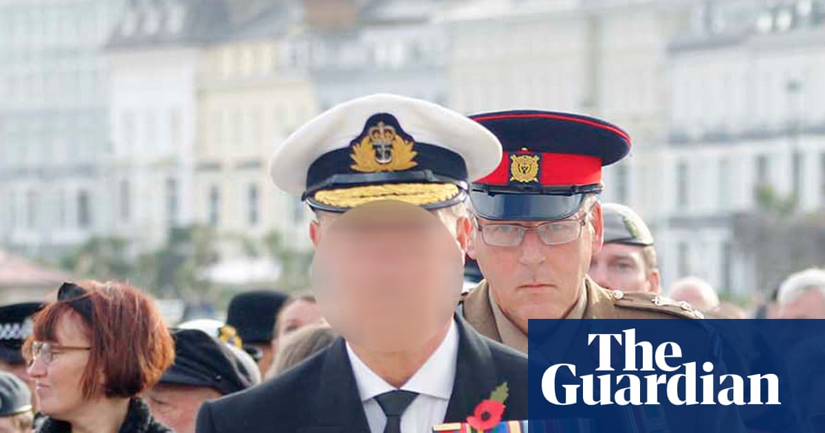 Man charged after ‘fake admiral’ seen at Remembrance Sunday event | UK news