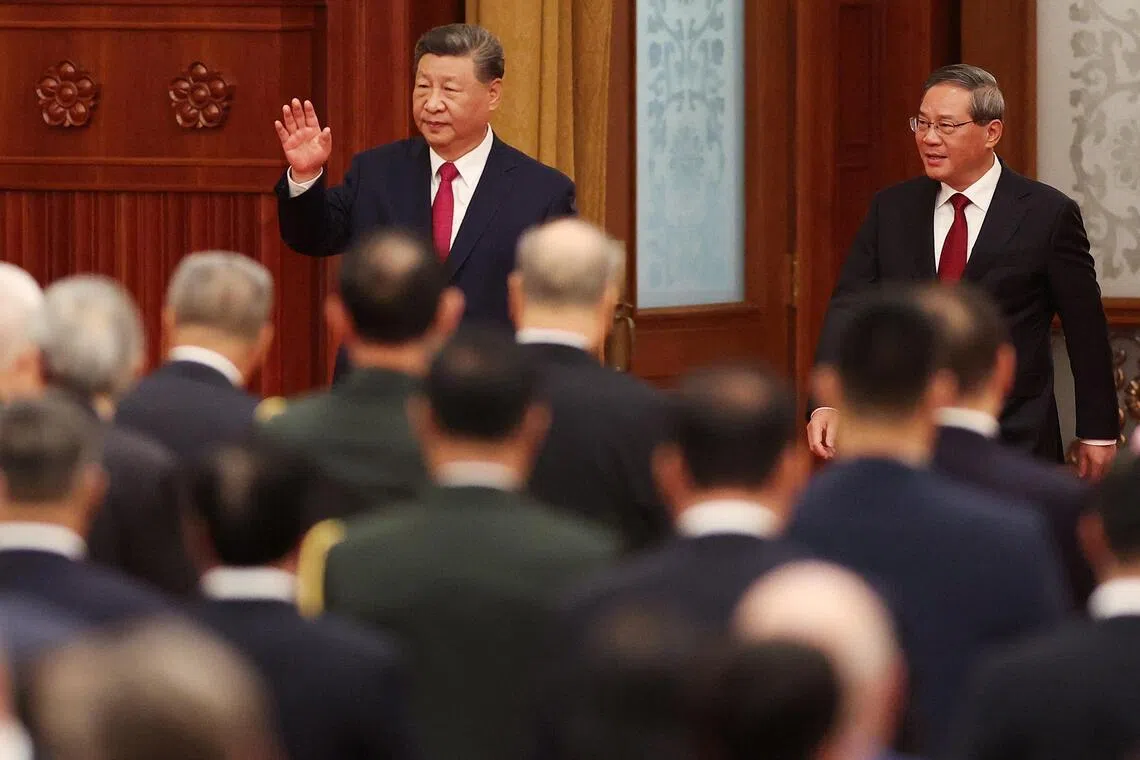 China's premier Li Qiang (right) is becoming President Xi Jinping’s top emissary on the world stage.