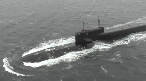 Reuters A still image from video, released by the Russian Defence Ministry, shows what it said to be Russia's strategic nuclear-powered ballistic missile submarine