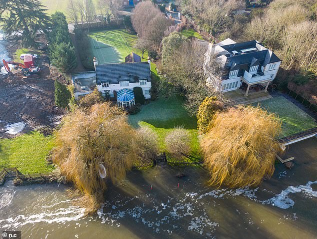 Ricky's current home on the banks of the Thames. The comedian will have to gain a special flood permit and has been advised to sign up to a helpline if his plans are approved to demolish a £6million home in Marlow and replace it with a swanky mansion