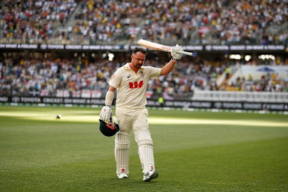 Travis Head salutes the Perth crowd after his remarkable knock in the first Ashes Test.