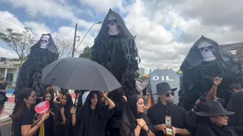 Protesters carried coffins