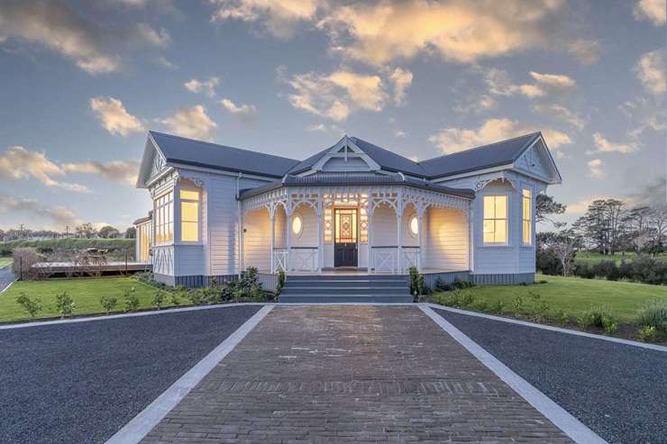 Huntly House, at 111 Wharf Road, in Clarks Beach, Franklin, started life in Palmerston North. Photo / Supplied