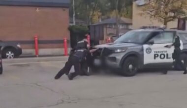 Toronto police car accidentally runs over suspect, officer