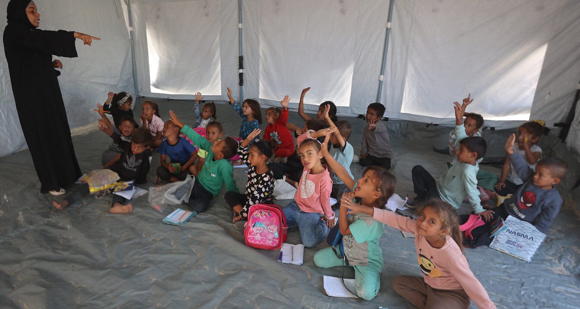 Despite Israel's bid to shut it, UNRWA resumes teaching in Gaza as kids hit books amid rubble