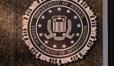 Veteran FBI employee sues bureau after being fired over displaying a pride flag - CTV News