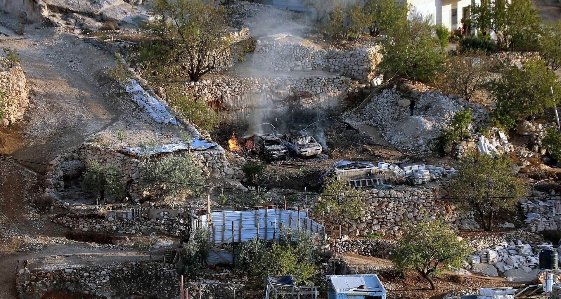 Jewish extremists burn Palestinian homes and cars in West Bank; IDF searching for perps