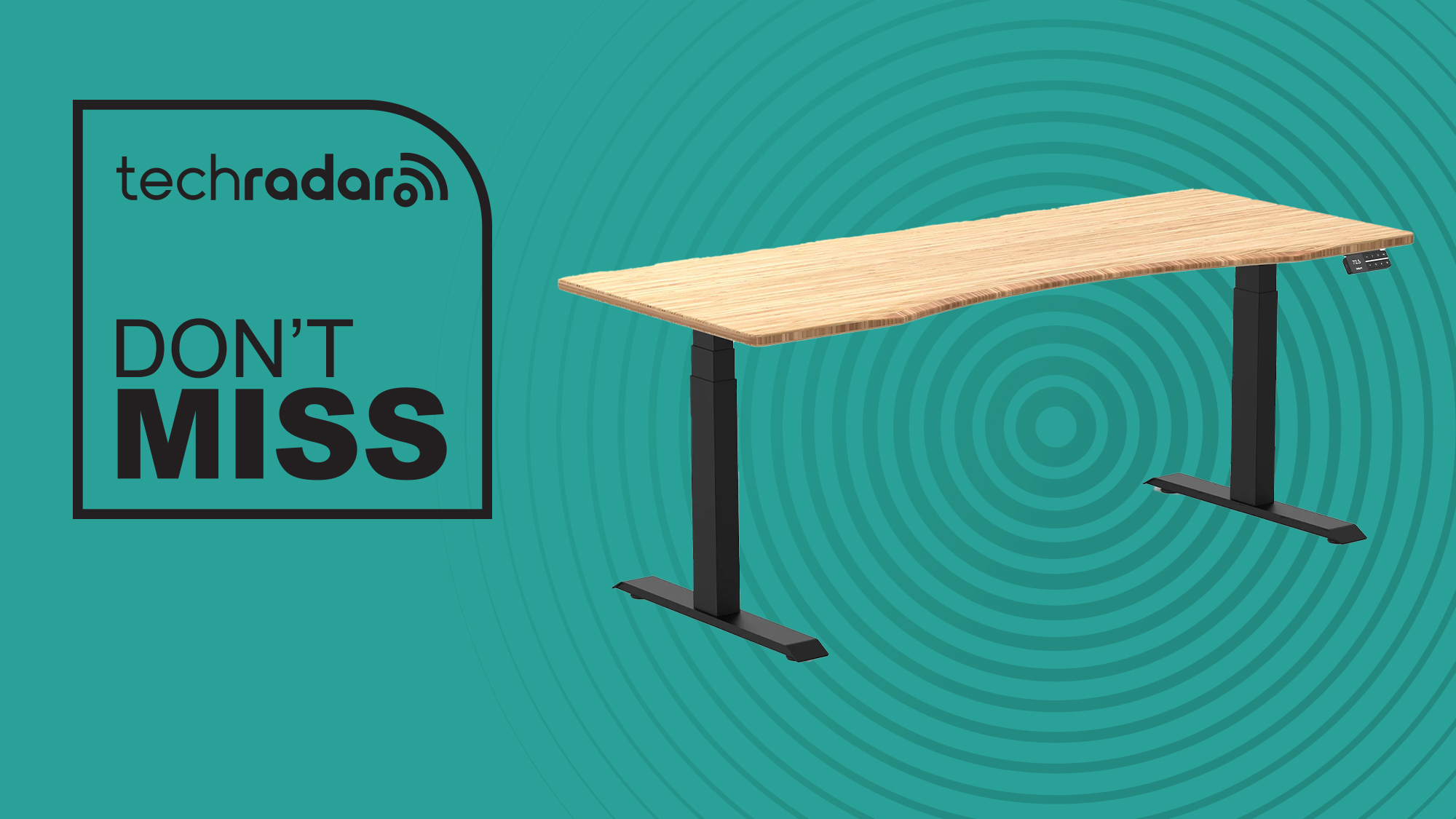 A Desky Dual standing desk with bamboo finish and black frame on a cyan background with a TechRadar Don't Miss deal label