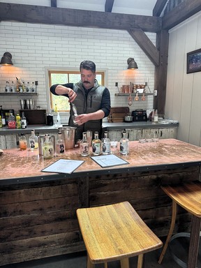 Joe Luckhurst preparing a cocktail at Luckhurst Farm & Distillery in Kelowna