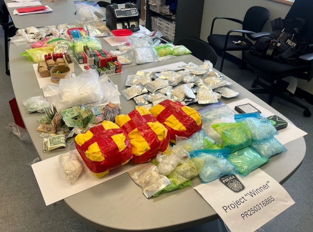 Drugs and cash seized during a drug trafficking investigation. 