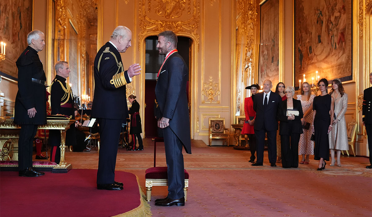 Sir David Beckham is made a Knight Bachelor by King Charles III during an Investiture ceremony at Windsor Castle, Berkshire. Pic: Jonathan Brady/PA Wire