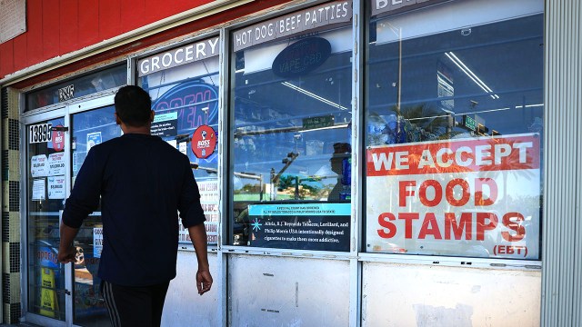 A sign in the window of a Miami grocery store shows it accepts payments through the Supplemental Nutrition Assistance Program, or SNAP. (Joe Raedle/Getty Images)