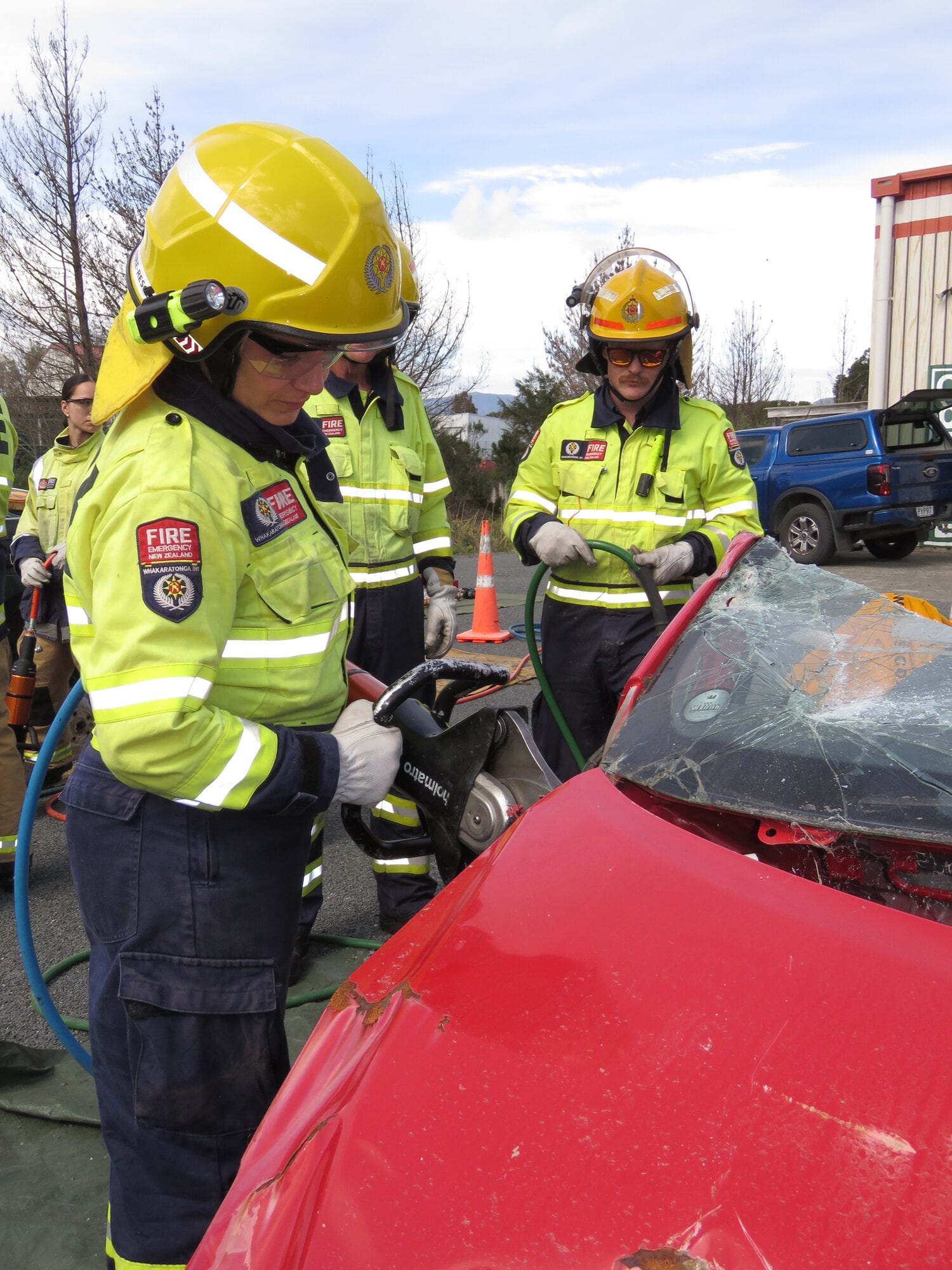  Katikati volunteer firefighter Siobhan Arrow using the using the jaws of life in the Motor Vehicle Extrication (MVE) course. Photo / Merle Cave