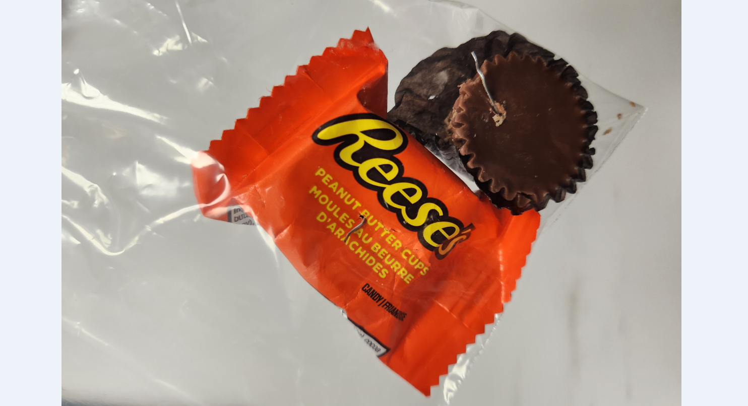 Surrey police warn parents about sharp object found in Halloween candy.