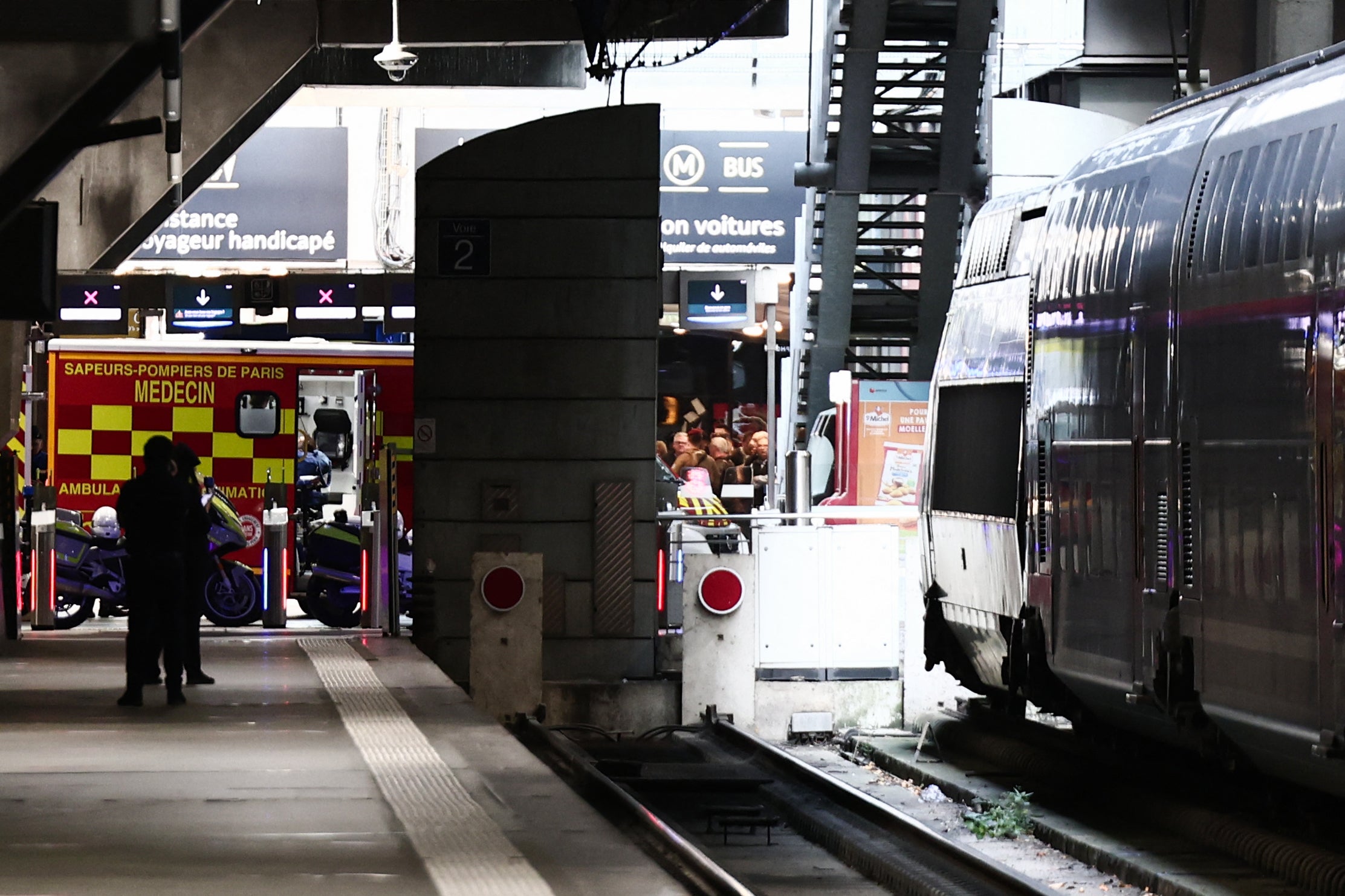A firefighter van is seen parked at a platform of the train station