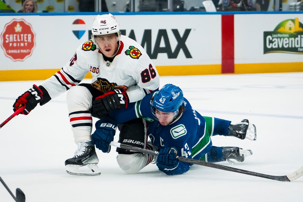 Canucks outshoot Blackhawks 45-28, lose 5-2