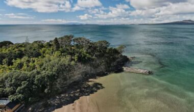 Woman rescued from battering of incoming tide at Castor Bay