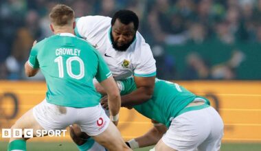 Ox Nche is tackled by Jack Crowley