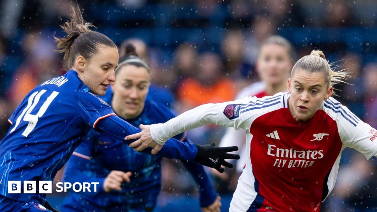 Nathalie Björn of Chelsea and Alessia Russo of Arsenal compete for the ball