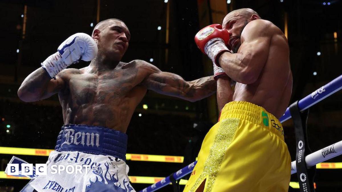 Conor Benn lands a punch on Chris Eubank Jr