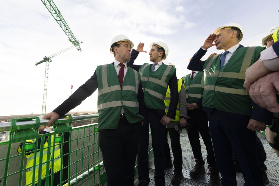 Junior Minister John Cummins with Micheál Martin and Simon Harris (right and centre) at the new housing plan launch last week. Photo: Sam Boal/Collins Photos