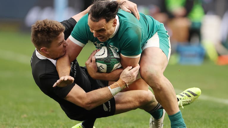 Beauden Barrett tackles James Lowe during the All Blacks' win over Ireland in Chicago.