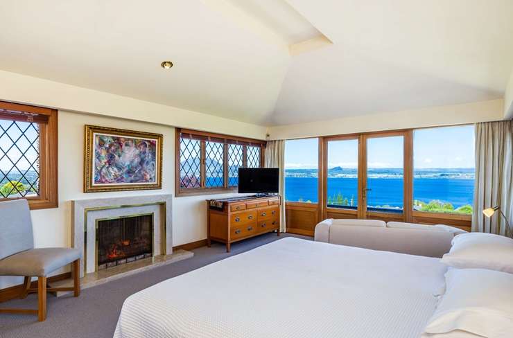 Shirley and Gary Akers are selling Lake Taupō Lodge, in Acacia Bay, after deciding now is the time to retire Photo / Supplied