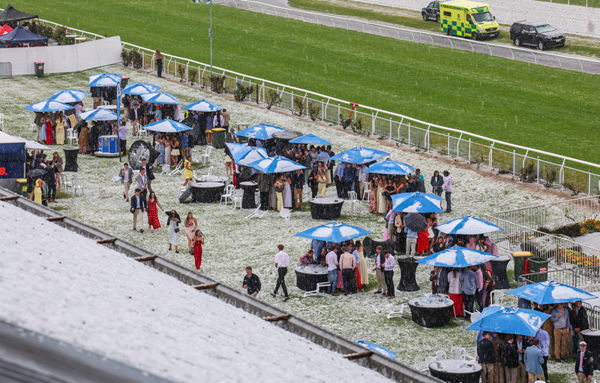 Riccarton is sheeted in hail after an extraordinary storm on New Zealand Cup Day. Photo: Race Images South
