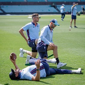 Veterans (back-front) Josh Hazlewood, Nathan Lyon and Mitchell Starc warm up at NSW Sheffield Shield training at the SCG.
