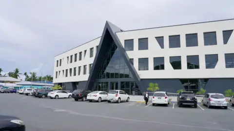 "One Stop Shop", a government building donated by Taiwan, hosts many government offices, including the President's office