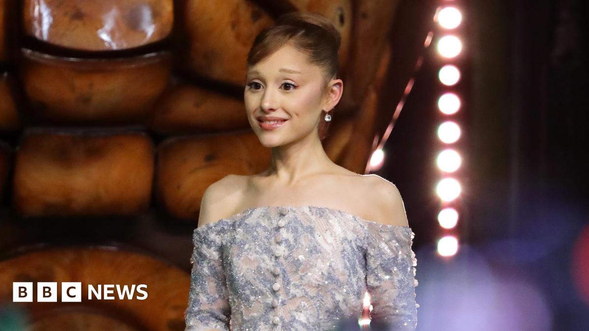 Ariana Grande, in a champagne pink sequin dress, attends the "Wicked: For Good" Asia-Pacific premiere at Universal Studio Singapore on 13 November