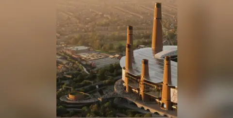 Birmingham City A section of the stadium is bathed in sunlight in an aerial view, Five towers are visible with crowds walking around the ground and around a circular section to the left.