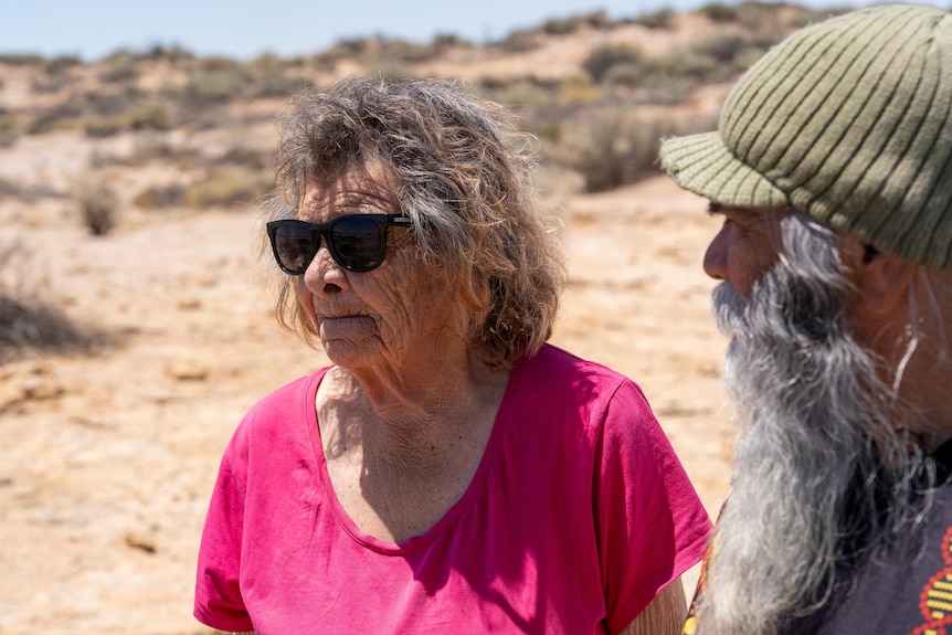 An Arabana elder wearing sunglasses.