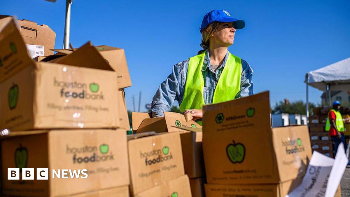 Woman moves food boxes