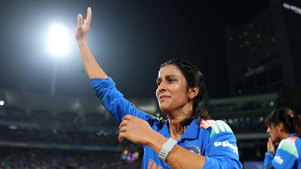 An emotional Jemimah Rodrigues of India celebrates scoring an unbeaten century to help her side reach the Women's Cricket World Cup final 2025