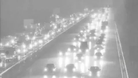National Highways A screenshot from a traffic camera showing congestion on the M5. 