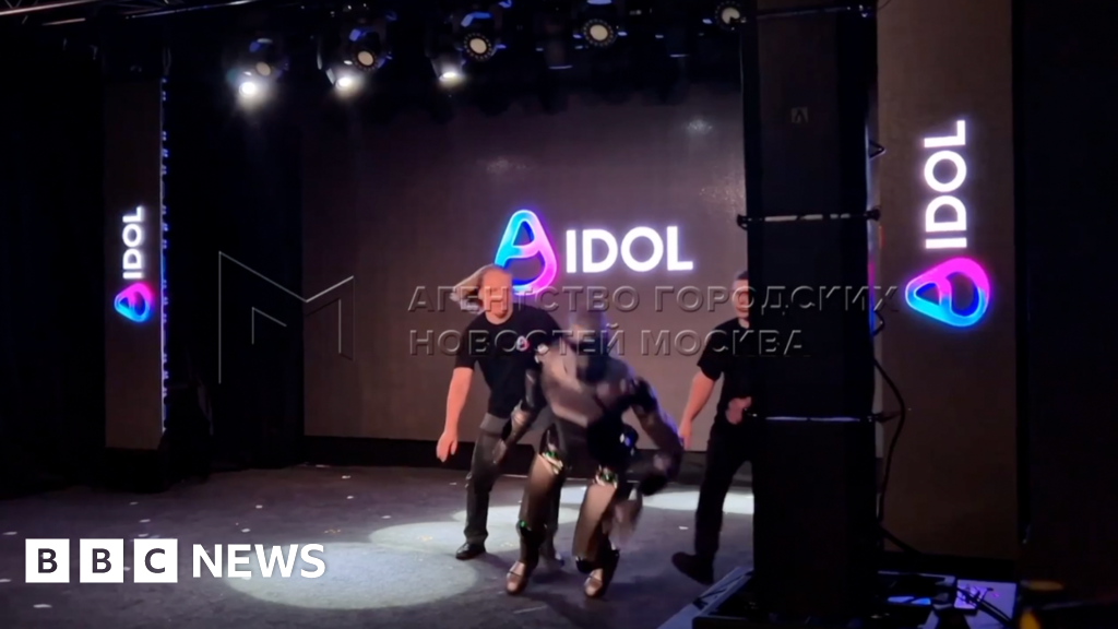 Russian AI robot falls on stage during debut