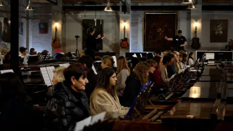 101 Pianos People playing 111 pianos in Nottinghamshire