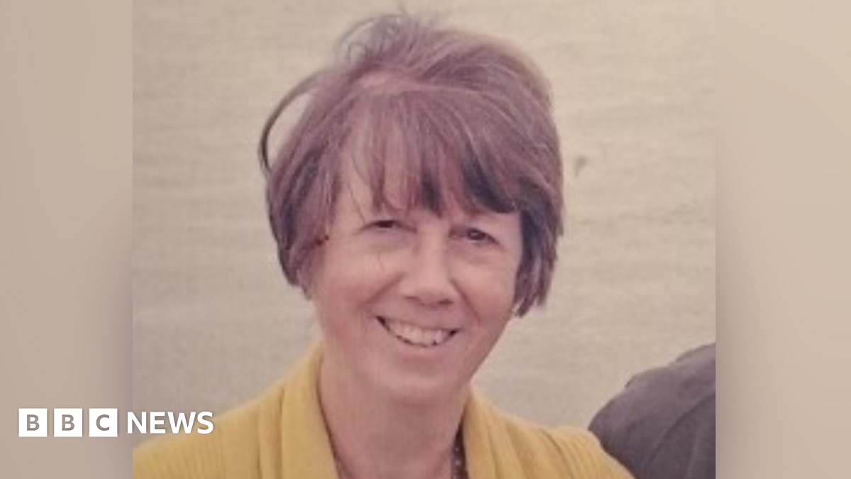 Family having a moment together messing about while winter sea swimming